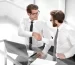 close-upemployees-shaking-hands-desk_252847-20542